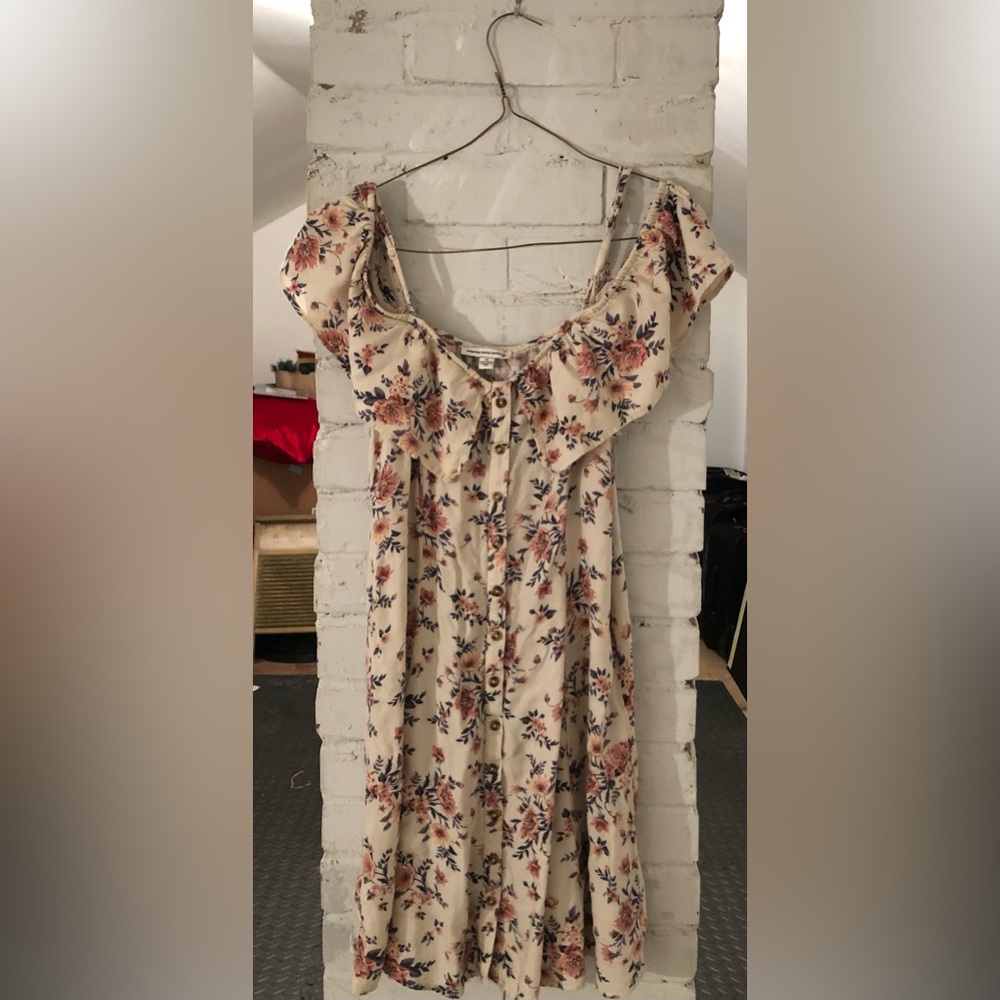 American Eagle Outfitters off the shoulder cream dress with pink floral design.